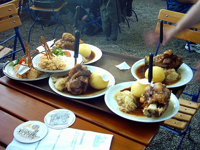 Roast pork knuckle and Obatzda in the Spitalgarten beer garden, Regensburg.