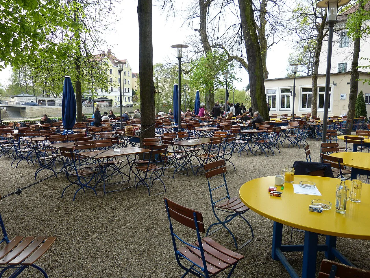 Tables under the trees in the Spitalgarten beer garden, Regensburg.