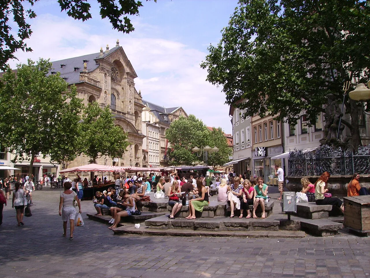 People around the fountain on the Grüner Markt, Bamberg.
