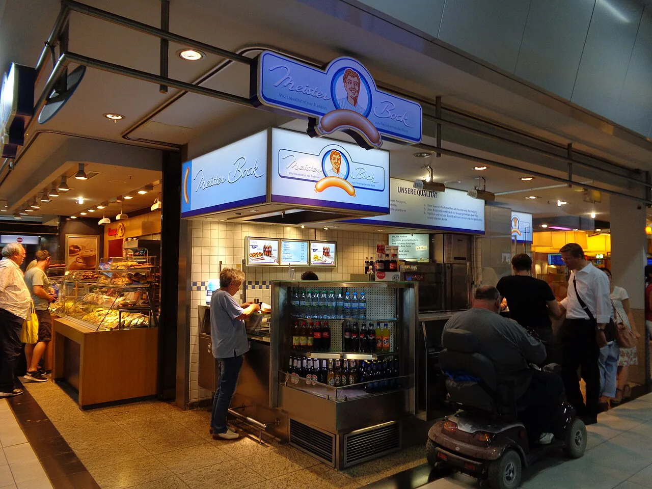 Meister-Bock snack counter inside Düsseldorf main station.