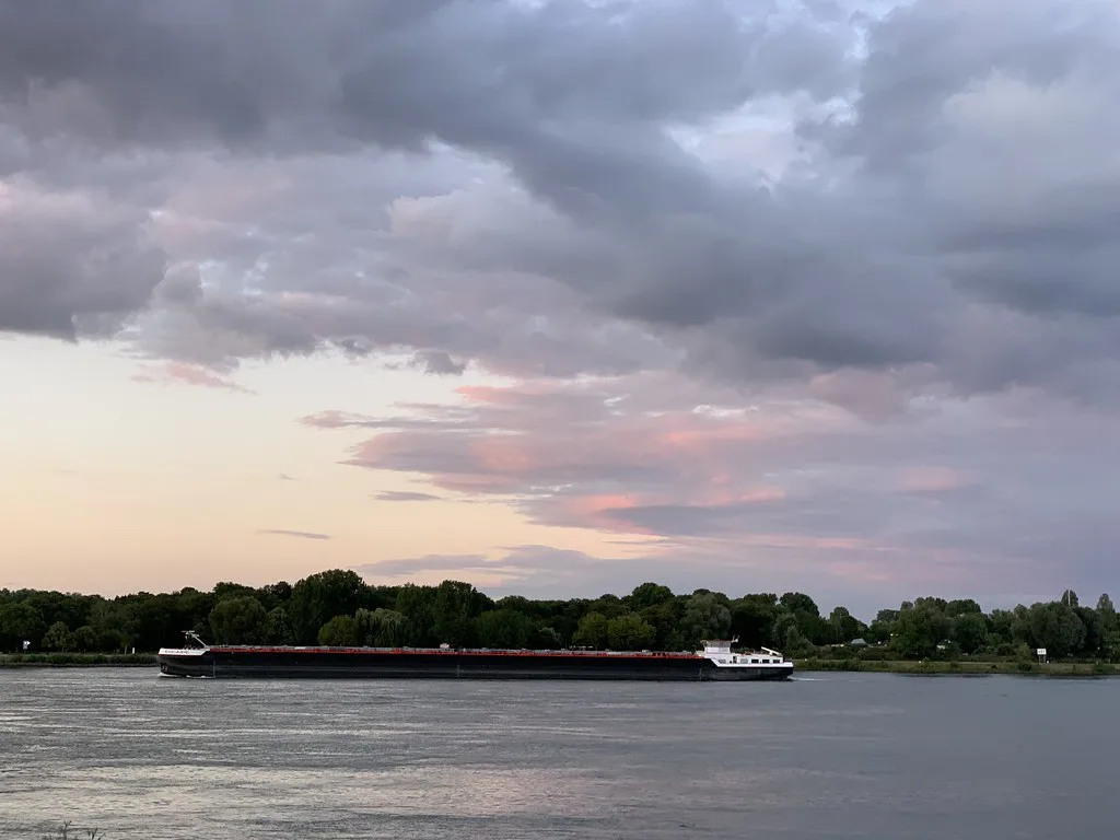 A barge on the Rhine at dusk, Mainz.
