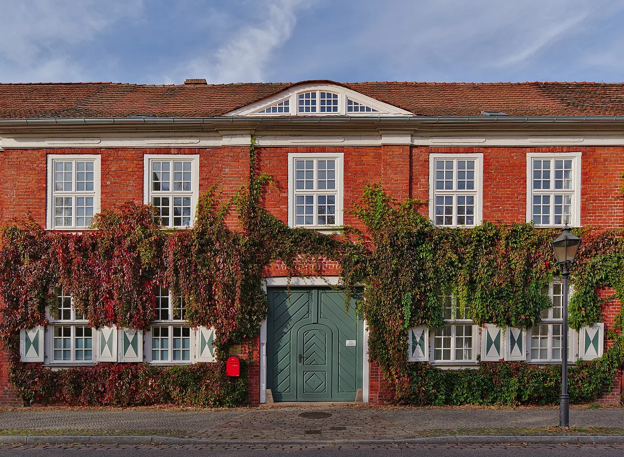 An ivy-covered red-brick house on Gutenbergstraße in the Dutch Quarter, Potsdam.