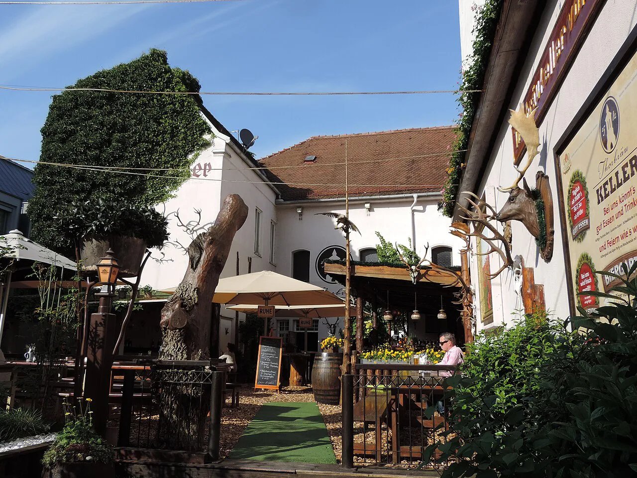 The entrance and beer garden of the Thorbräu Bräustüberl, Augsburg.