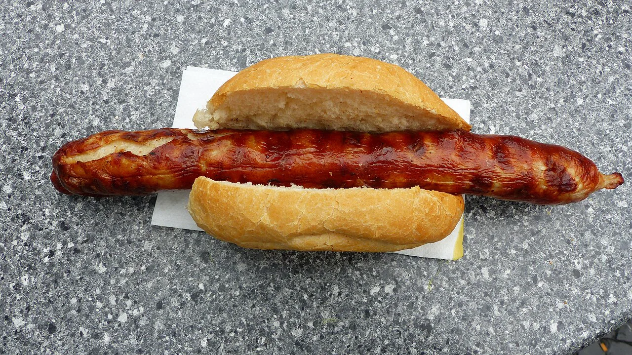 Thuringian Rostbratwurst in a bread roll at the market in Weimar.