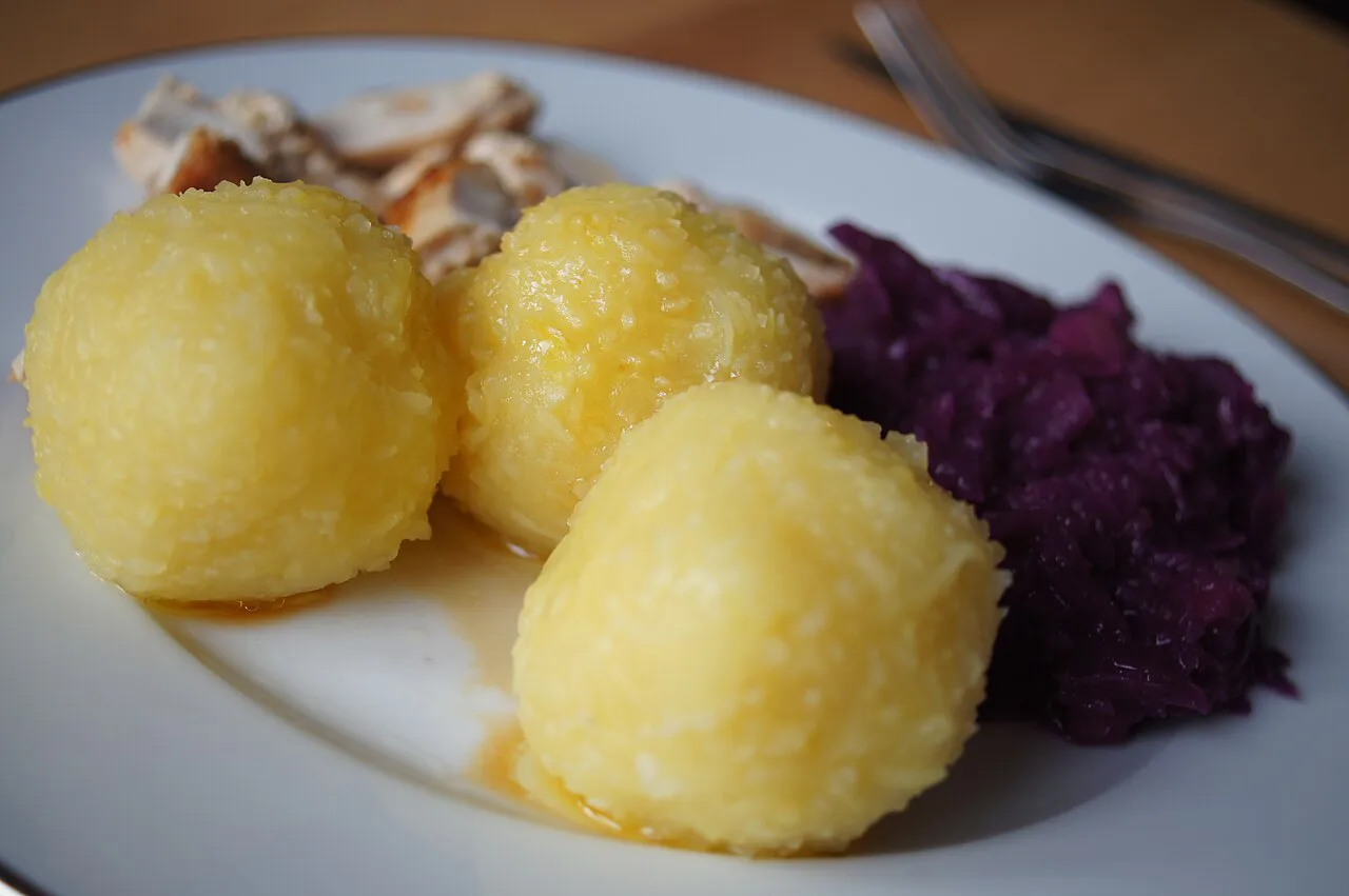 Roast rabbit with Thuringian dumplings and red cabbage.