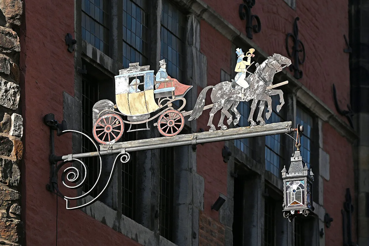 The stagecoach sign on the Ratskeller, Aachen.