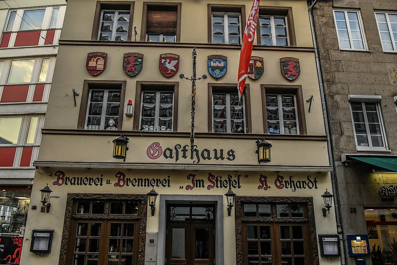 Facade of Gasthaus Im Stiefel, a traditional brewery tavern in Bonn.