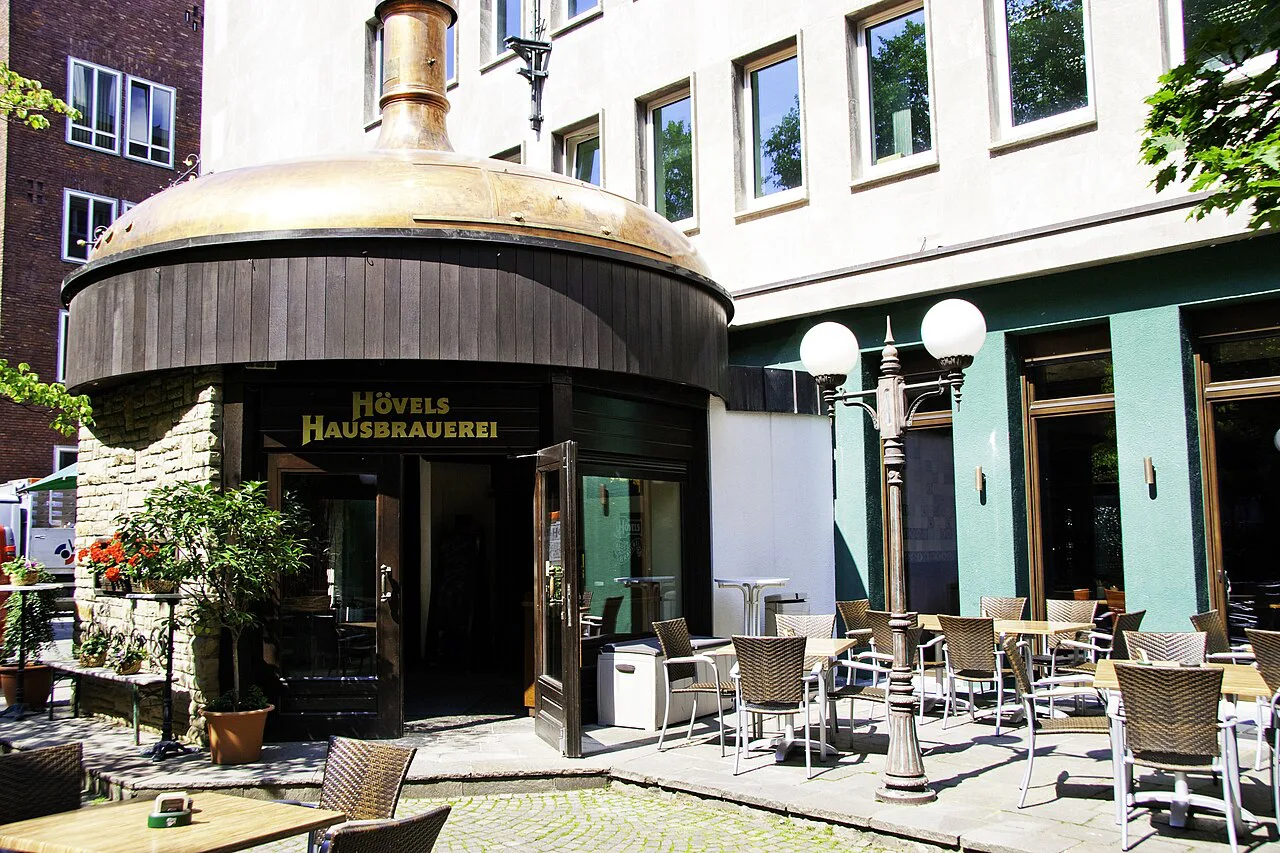 The copper-kettle entrance and terrace of Hövels Hausbrauerei, Dortmund.