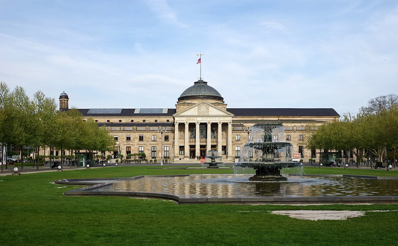 The Kurhaus seen across the Bowling Green fountains, Wiesbaden.