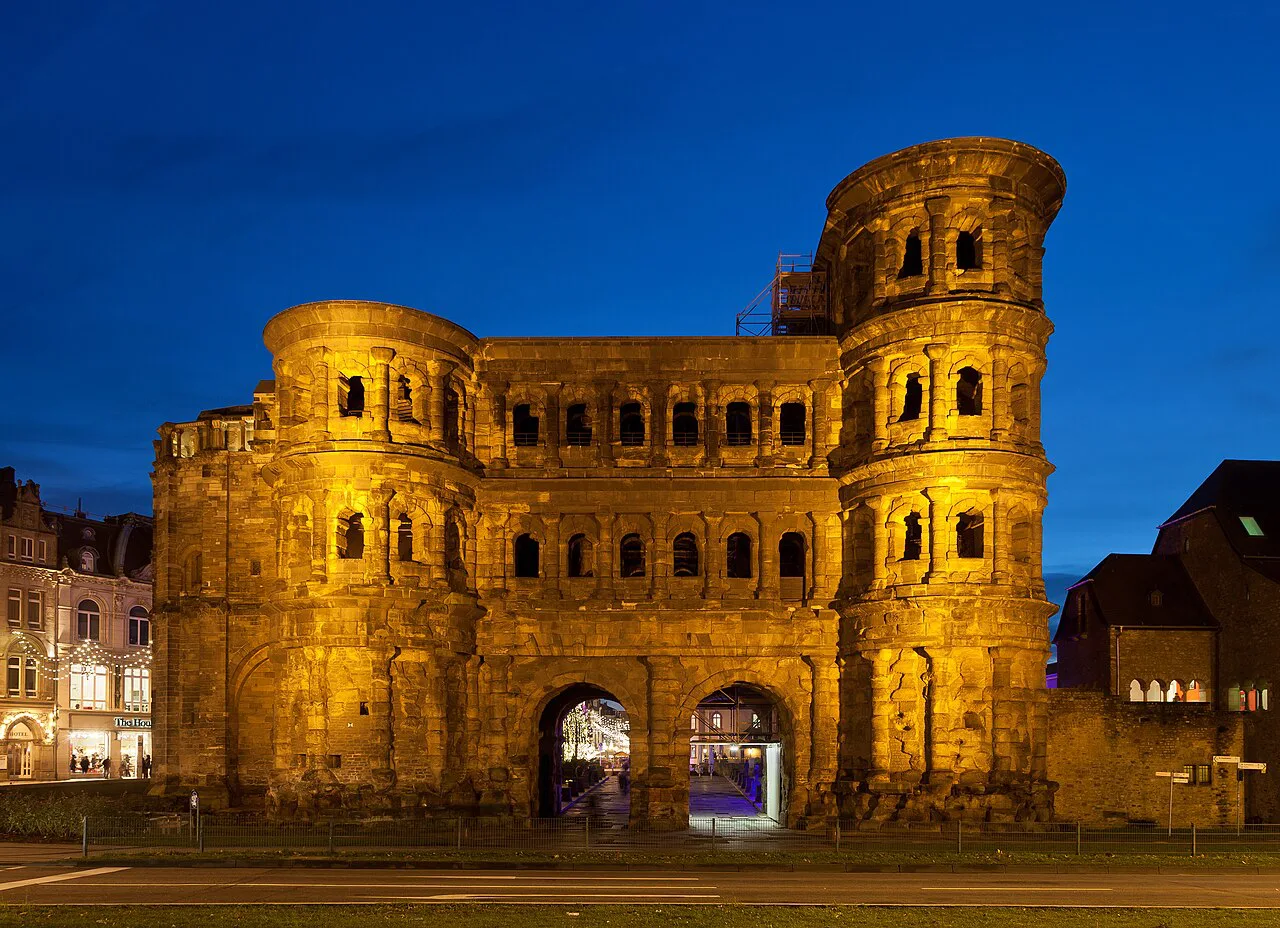 The Porta Nigra Roman gate lit up in the evening, Trier.