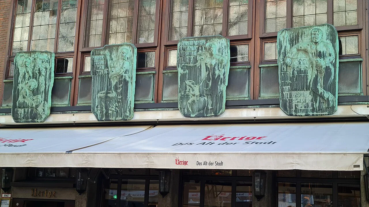 Copper reliefs above the Uerige brewery tavern, Düsseldorf.