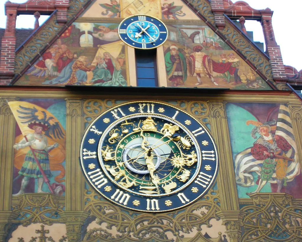 The painted facade and astronomical clock of Ulm Town Hall.
