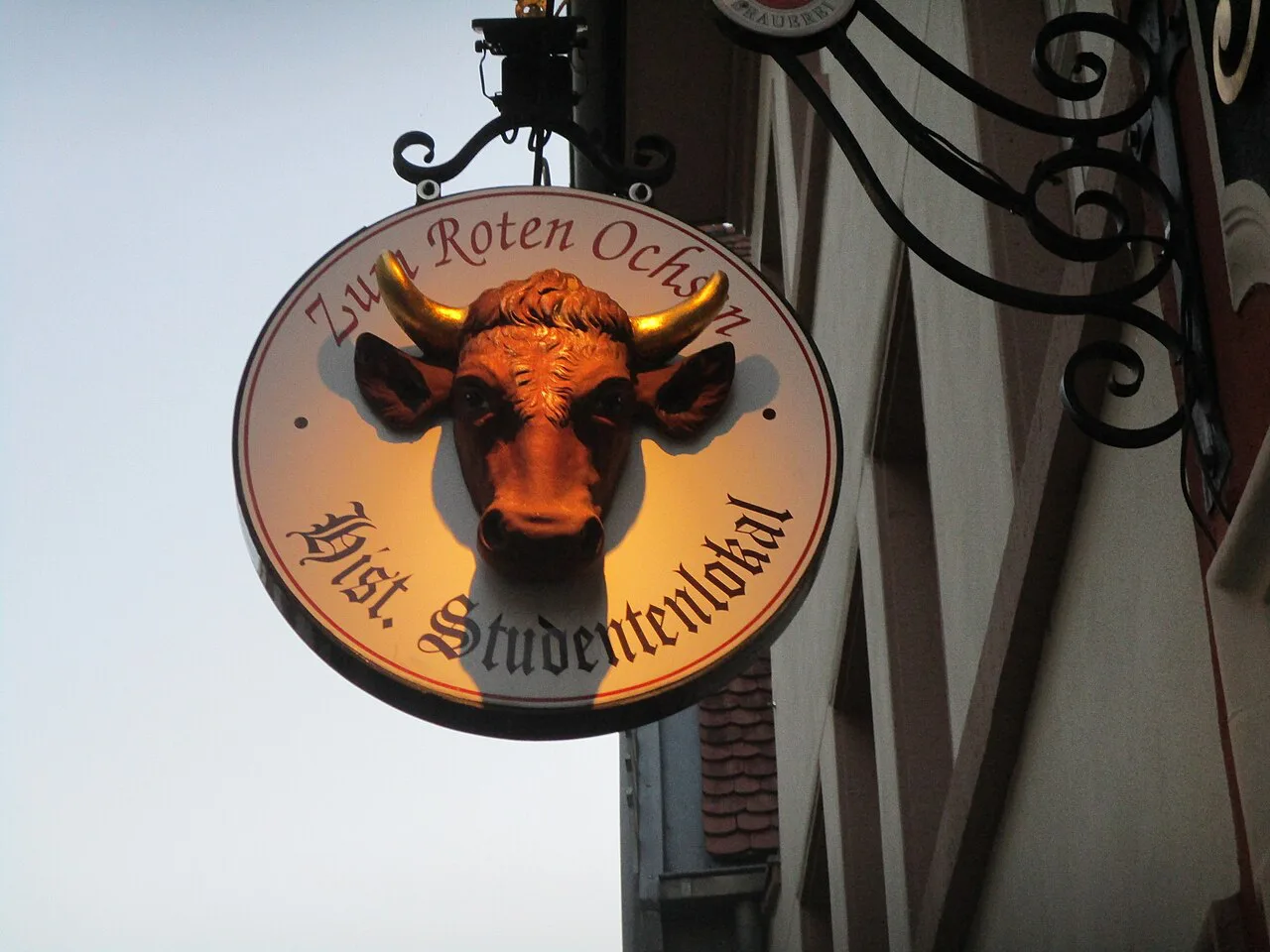Hanging sign of the historic Zum Roten Ochsen student tavern, Heidelberg.