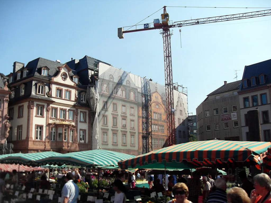 Saturday market stalls in front of old-town houses, Mainz.