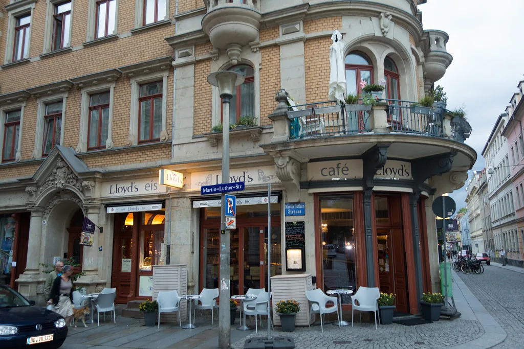 A corner café with outdoor tables, Dresden.