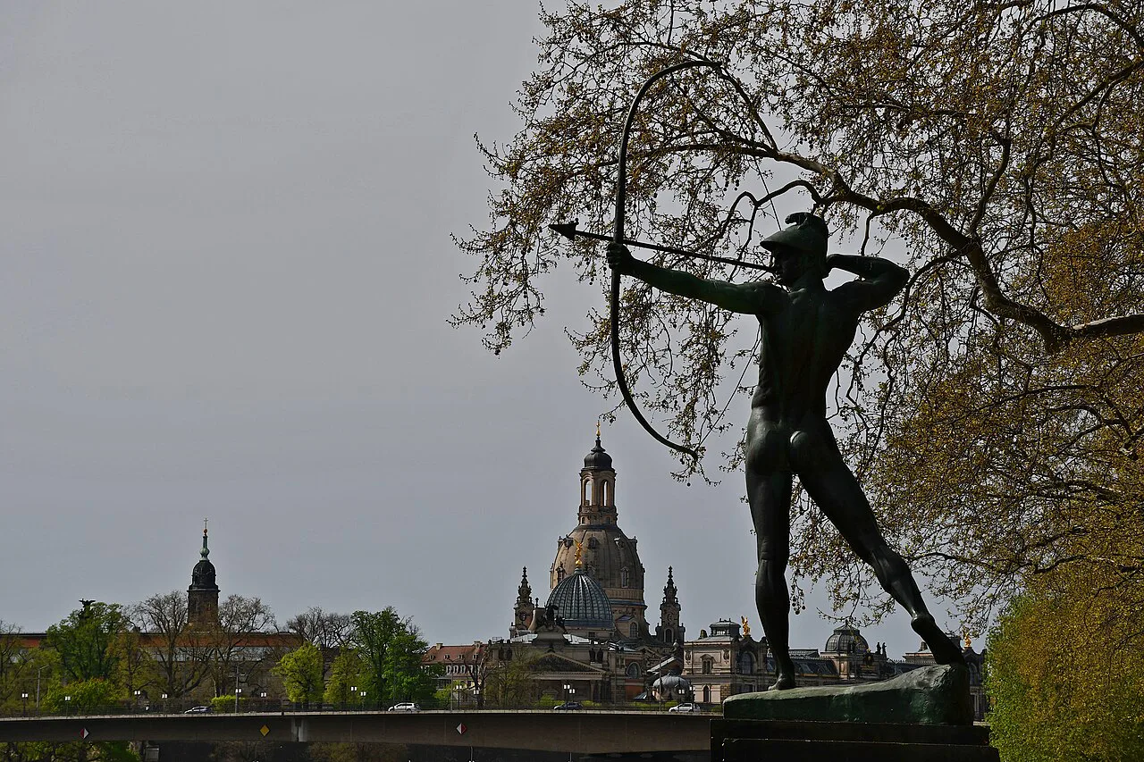 The Archer statue above Dresden's old town with the Frauenkirche dome behind, Dresden.