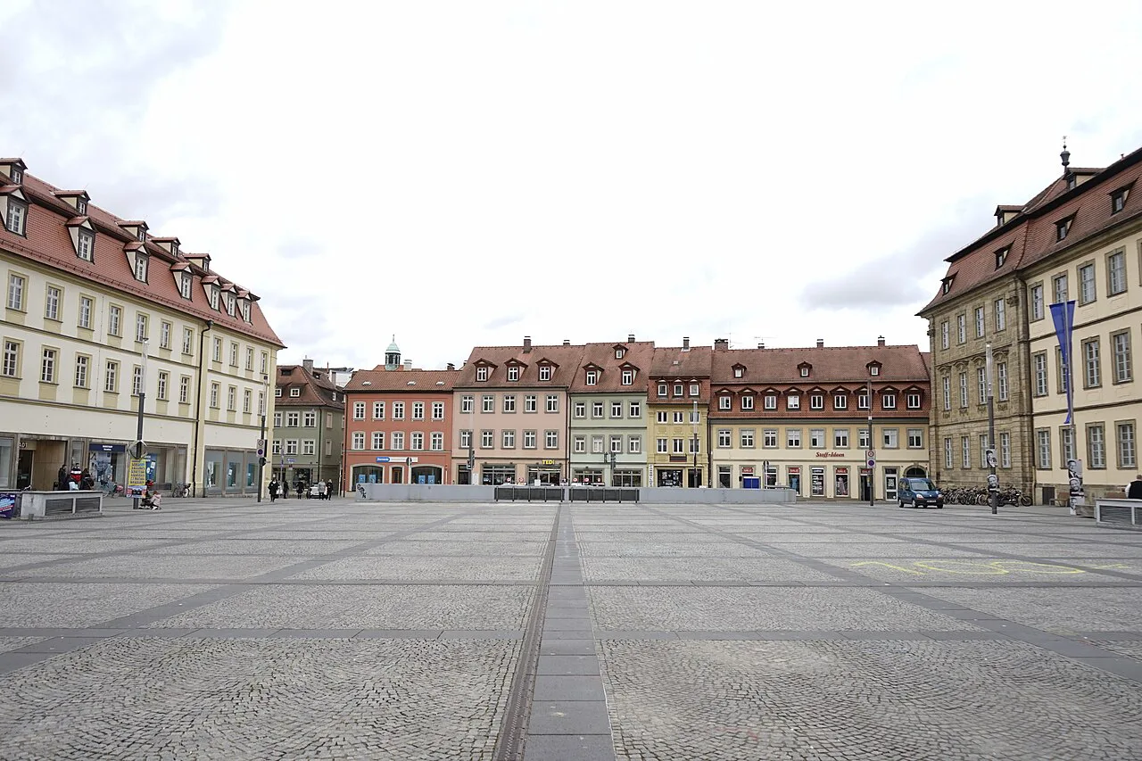 A broad square lined with baroque buildings in central Bamberg.
