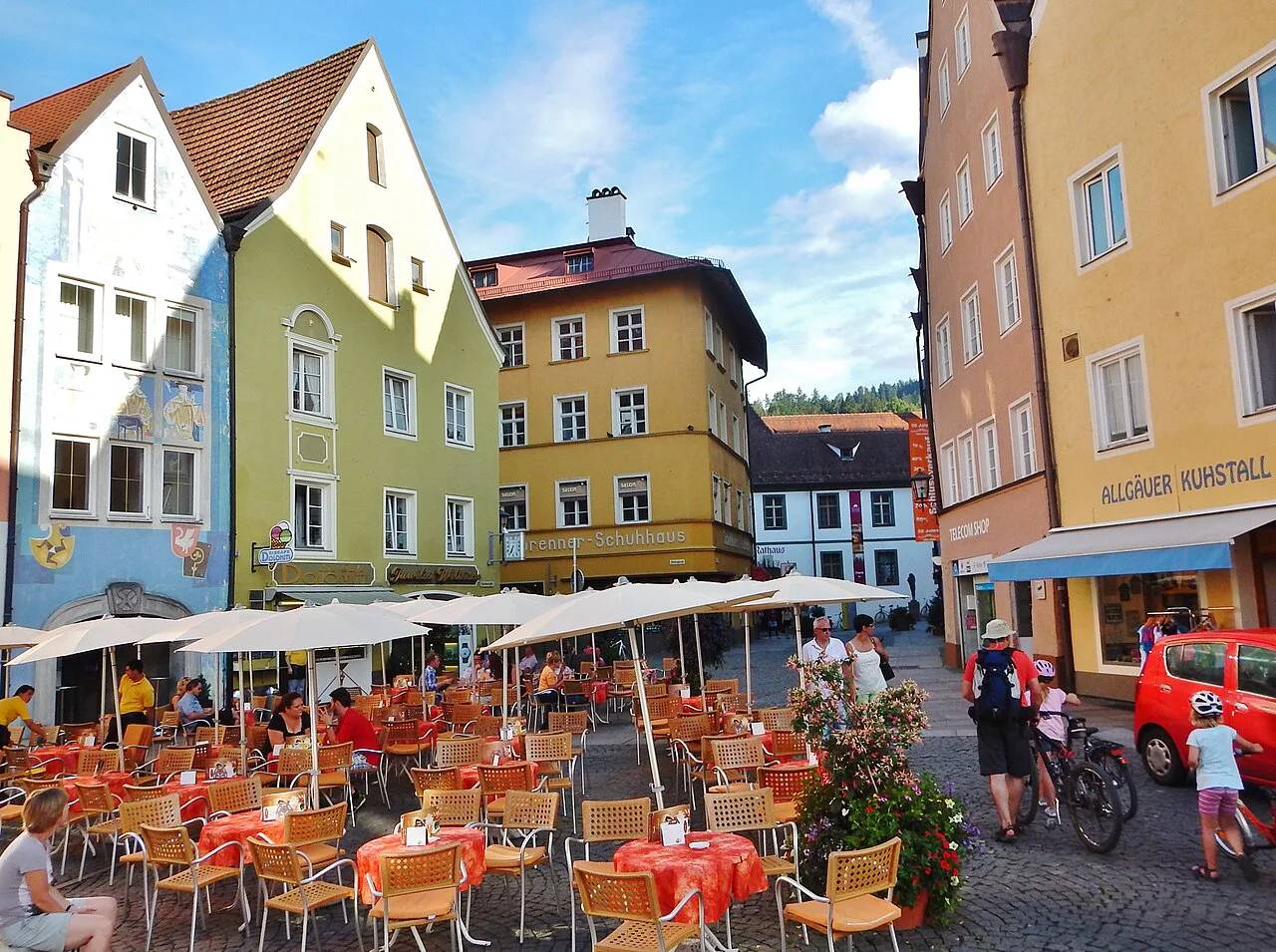 Outdoor café tables in the old town of Füssen.