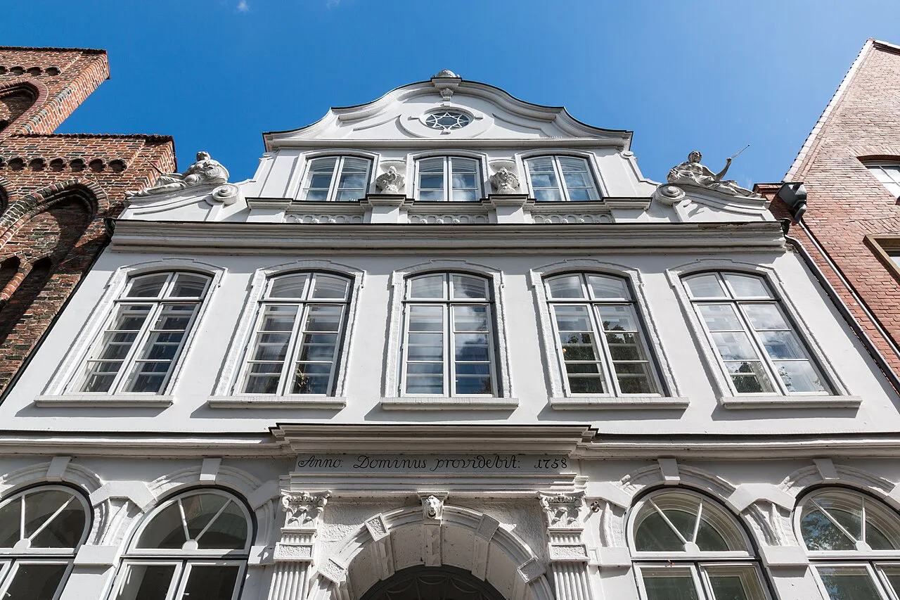 The white facade of the Buddenbrookhaus on Mengstraße, Lübeck.