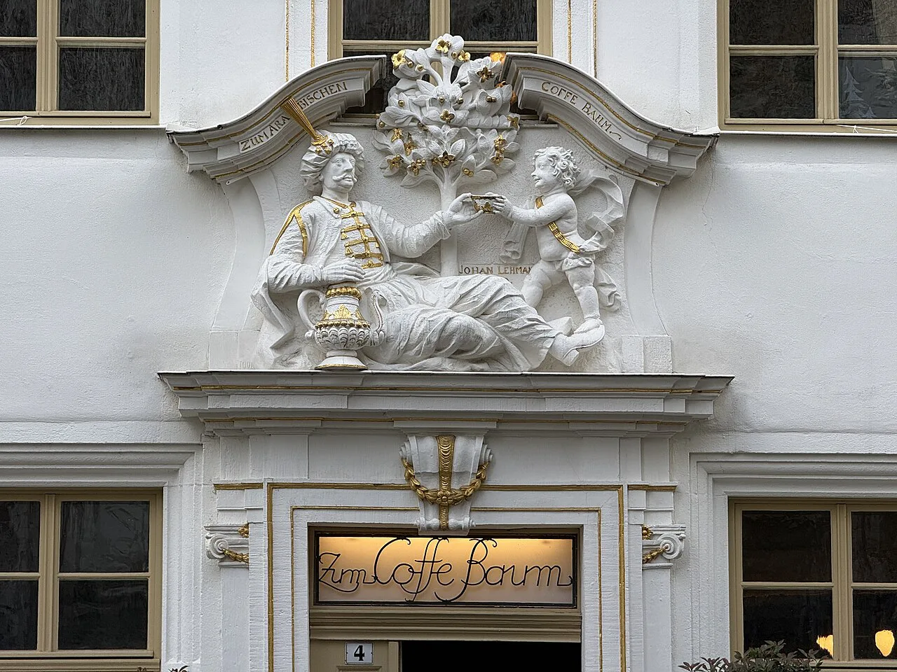 The carved doorway and sign of Zum Arabischen Coffe Baum, Leipzig.