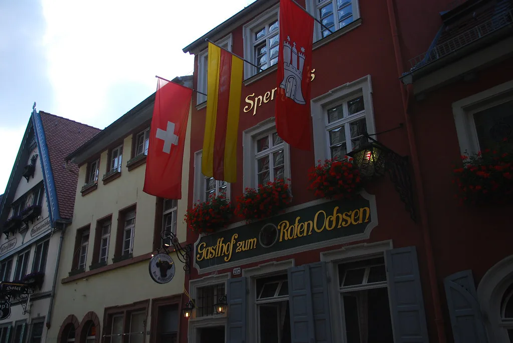 The facade and sign of Gasthof zum Roten Ochsen, Heidelberg.